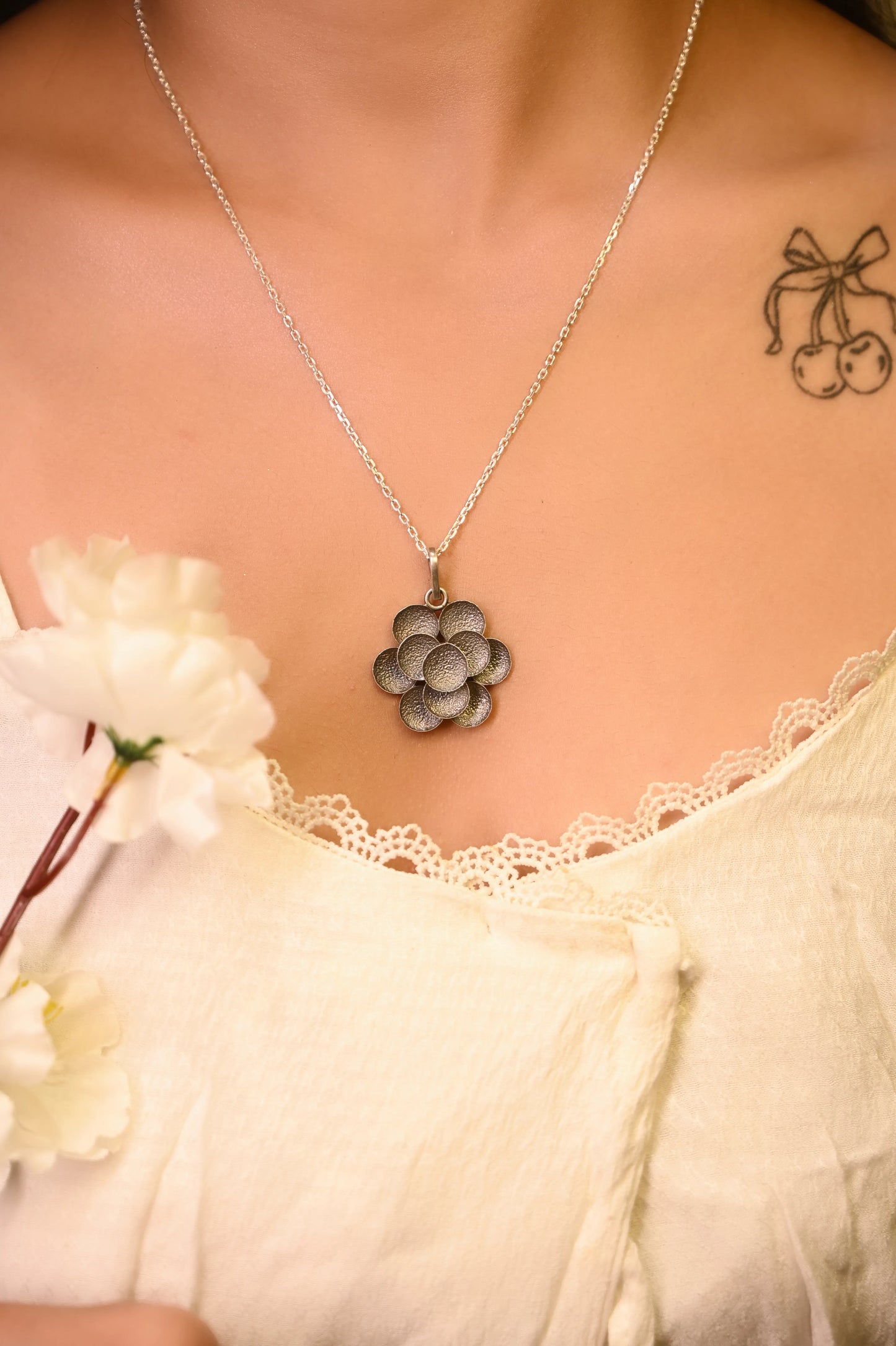 Ruh Embossed Flower Pendant