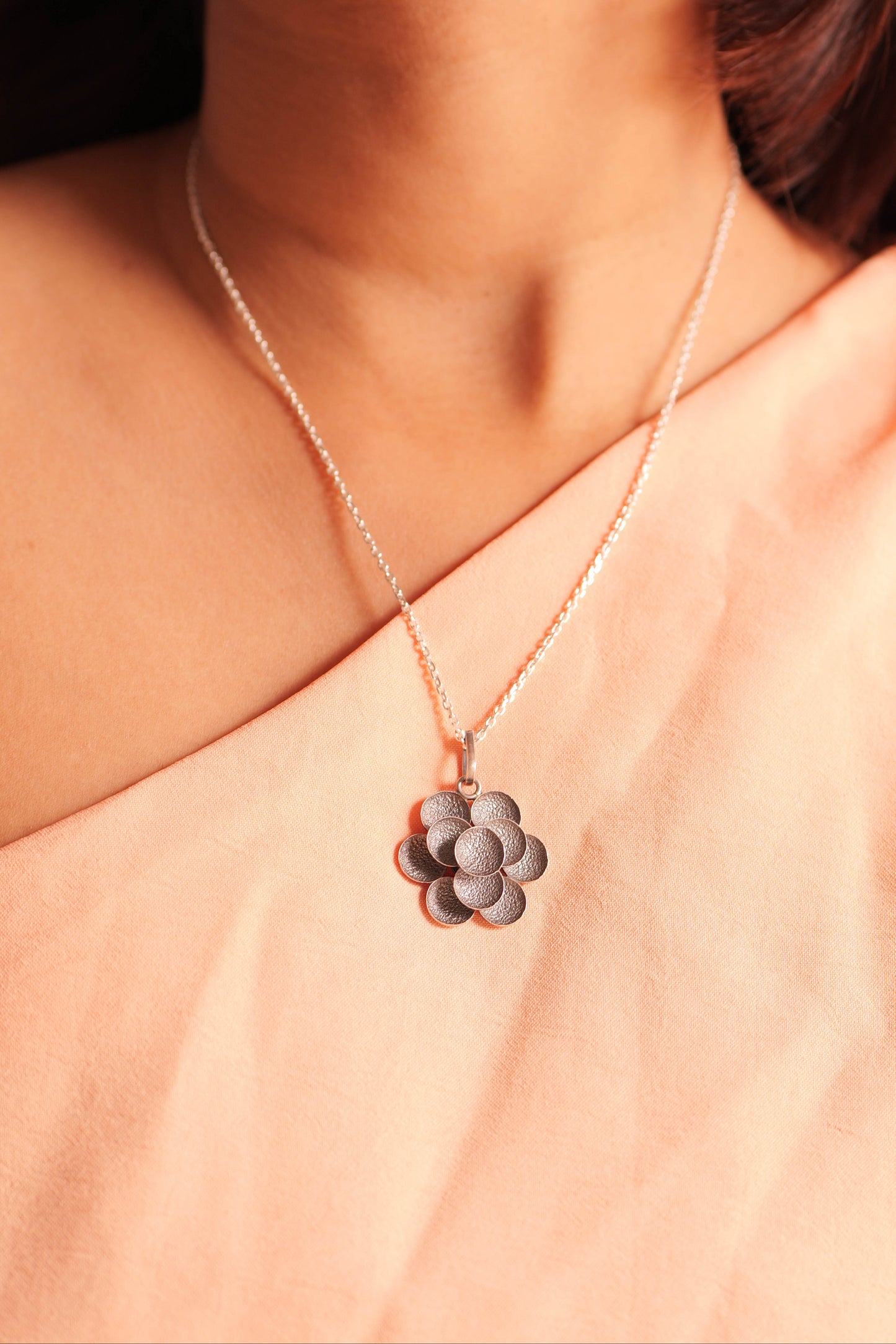 Ruh Embossed Flower Pendant