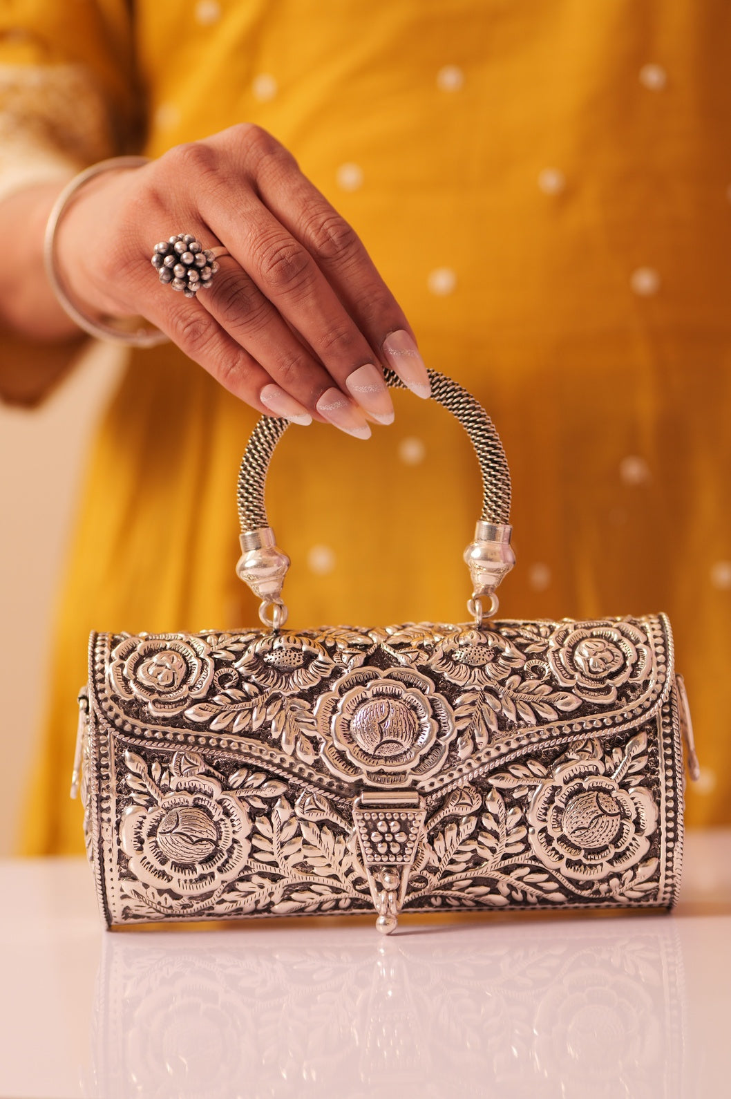 Virasat Intricate Floral Carving Purse