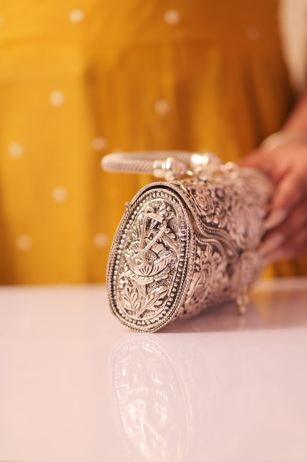 Virasat Intricate Floral Carving Purse