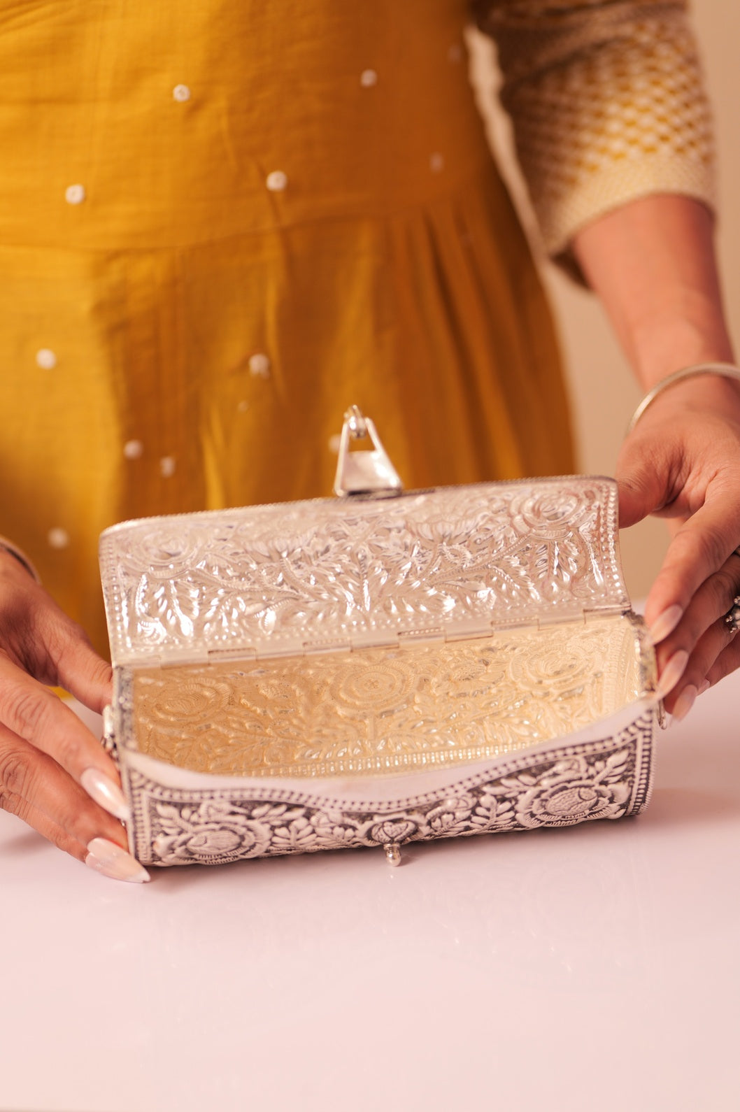 Virasat Intricate Floral Carving Purse